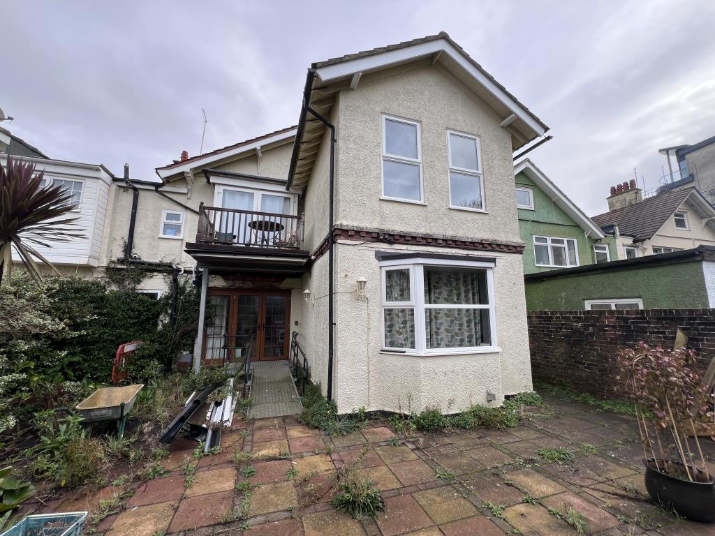 Lot: 3 - SIX-BEDROOM GUEST HOUSE FOR INVESTMENT - Rear elevation showing garden